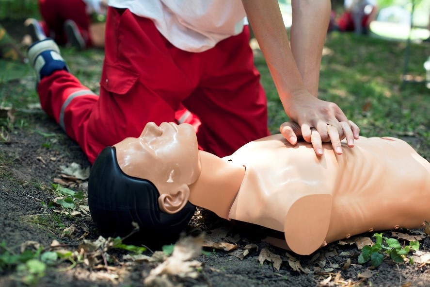 Woman performing CPR